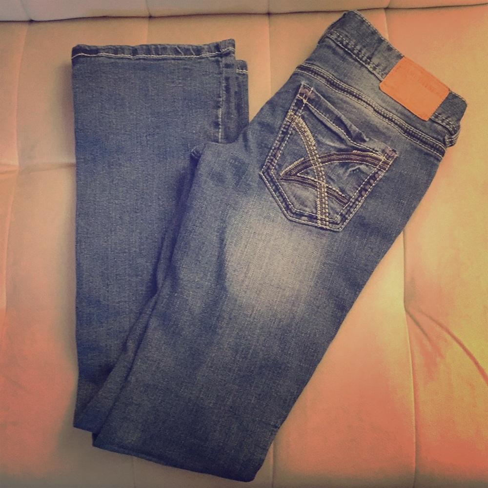 Distressed Amethyst blue jeans. Size 3